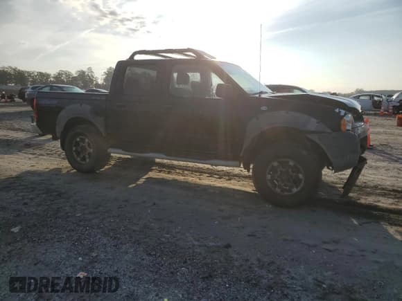 ✅ 2001 Nissan Frontier SE • VIN: 1N6ED27Y21C323917 • Lot: 80440105. Listed on Copart with Not provided. Free auction sales archive from the USA and detailed vehicle history report at DreamBid. Image 4.