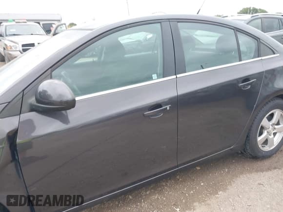 ✅ 2014 Chevrolet Cruze 1LT • VIN: 1G1PC5SB4E7195142 • Lot: 43022219. Listed on IAAI with 148,506 mi. Free auction sales archive from the USA and detailed vehicle history report at DreamBid. Image 15.