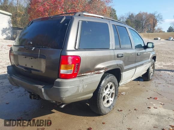 ✅ 1999 Jeep Grand Cherokee Laredo • VIN: 1J4GW58SXXC665247 • Лот: 43728247. Опубликован ранее на IAAI с пробегом 257 452 миль. Бесплатный доступ к архиву аукционных продаж из США и подробный отчёт об истории автомобиля на DreamBid. Изображение 4.