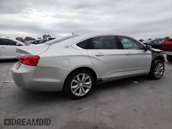 2017 Chevrolet Impala LT with VIN 2G1105SAXH9153616, listed as a Copart auction lot 87471965 with 217,950 mi miles and Salvage title. Bid and sale history available at DreamBid. Image 3.
