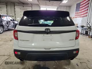 ✅ 2021 Honda Passport EX-L • VIN: 5FNYF8H52MB003912 • Lot: 89476825. Wystawiony na Copart z przebiegiem 65 306 mil. Bezpłatny archiwum sprzedaży aukcyjnych z USA i szczegółowy raport historii pojazdu na DreamBid. Zdjęcie 6.