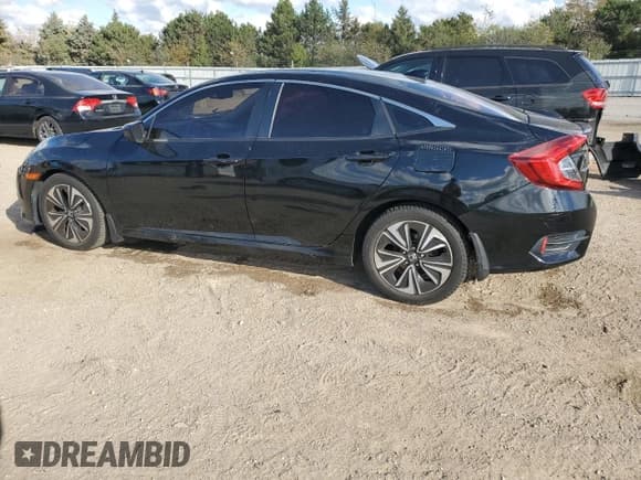 ✅ 2017 Honda Civic EX-L • VIN: 19XFC1F70HE211780 • Lot: 90470445. Listed on Copart with 127,427 mi. Free auction sales archive from the USA and detailed vehicle history report at DreamBid. Image 2.