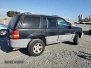 ✅ 1998 Jeep Grand Cherokee Laredo • VIN: 1J4FX58S6WC294787 • Лот: 71563695. Опубликован ранее на Copart с пробегом 198 537 миль. Бесплатный доступ к архиву аукционных продаж из США и подробный отчёт об истории автомобиля на DreamBid. Изображение 3.