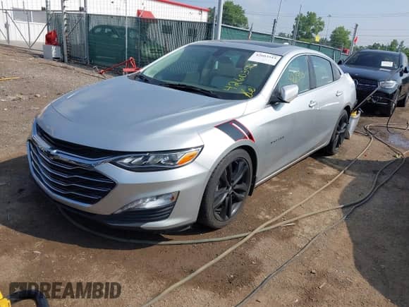 2020 Chevrolet Malibu Premier with VIN 1G1ZE5SX1LF144599, listed as a IAAI auction lot 42603515 with 69,715 mi miles and . Bid and sale history available at DreamBid. Image 2.
