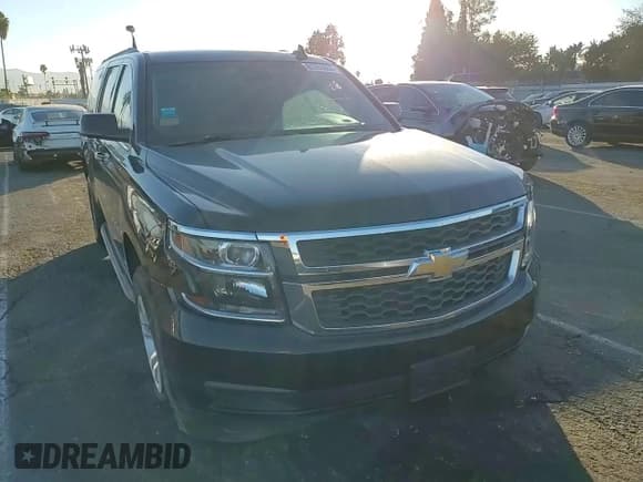 ✅ 2018 Chevrolet Suburban LT • VIN: 1GNSCHKC2JR228351 • Lot: 81263864. Wystawiony na Copart z przebiegiem 263 257 mil. Bezpłatny archiwum sprzedaży aukcyjnych z USA i szczegółowy raport historii pojazdu na DreamBid. Zdjęcie 12.
