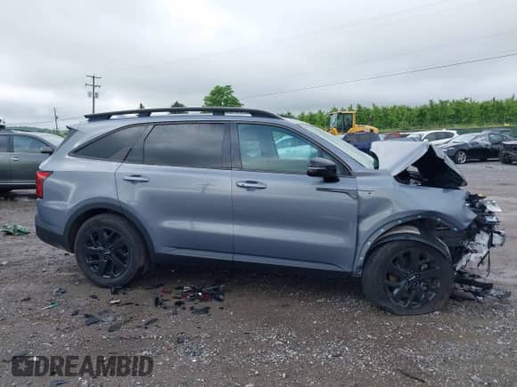 2022 Kia Sorento X-Line S z VIN 5XYRLDLC1NG085105, wystawiony jako IAAI lot #42375855 z przebiegiem 43 182 mil mil oraz . Historia ofert i sprzedaży dostępna na DreamBid. Obrazek 14.