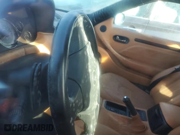 ✅ 2002 Maserati Spyder • VIN: ZAMBB18A320005469 • Лот: 78394424. Опубликован ранее на Copart с пробегом Не указан. Бесплатный доступ к архиву аукционных продаж из США и подробный отчёт об истории автомобиля на DreamBid. Изображение 9.