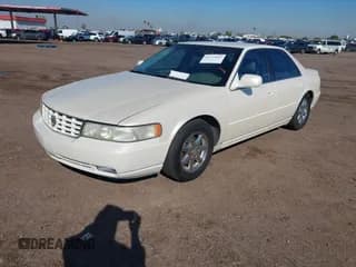 ✅ 1999 Cadillac Seville Touring STS • VIN: 1G6KY5497XU903789 • Lot: 43777667. Wystawiony na IAAI z przebiegiem 141 640 mil. Bezpłatny archiwum sprzedaży aukcyjnych z USA i szczegółowy raport historii pojazdu na DreamBid. Zdjęcie 2.