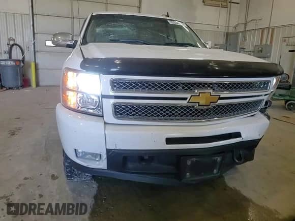 2012 Chevrolet Silverado 1500 LTZ z VIN 1GCRKTE7XCZ253075, wystawiony jako Copart lot #52034385 z przebiegiem 123 470 mil mil oraz Szkoda całkowita • Salvage title. Historia ofert i sprzedaży dostępna na DreamBid. Obrazek 11.