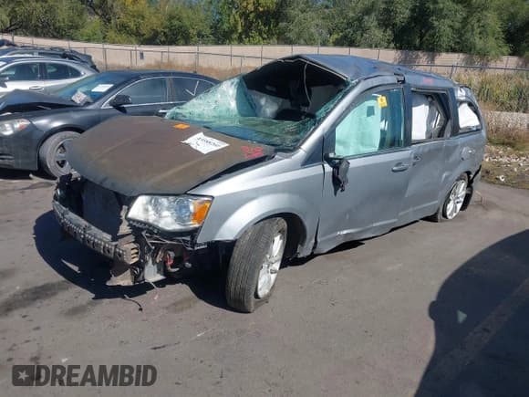 ✅ 2018 Dodge Grand Caravan SXT • VIN: 2C4RDGCG7JR192392 • Lot: 43388260. Wystawiony na IAAI z przebiegiem Nie podano. Bezpłatny archiwum sprzedaży aukcyjnych z USA i szczegółowy raport historii pojazdu na DreamBid. Zdjęcie 2.