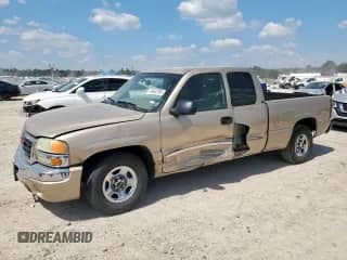 2004 GMC Sierra 1500 SLE with VIN 2GTEC19V941205974, listed as a Copart auction lot 64663185 with 193,934 mi miles and Salvage title. Bid and sale history available at DreamBid. Image 1.