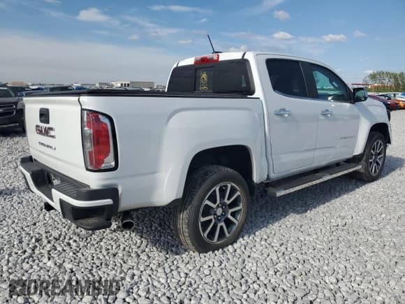✅ 2021 GMC Canyon 4WD Denali • VIN: 1GTG6EEN8M1280992 • Лот: 48177835. Опубликован ранее на Copart с пробегом 51 773 миль. Бесплатный доступ к архиву аукционных продаж из США и подробный отчёт об истории автомобиля на DreamBid. Изображение 3.