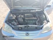 ✅ 2003 Honda Civic LX • VIN: 1HGES15533L002307 • Lot: 43097647. Listed on IAAI with 125,340 mi. Free auction sales archive from the USA and detailed vehicle history report at DreamBid. Image 10.