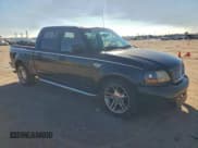 ✅ 2003 Ford F-150 Harley-Davidson • VIN: 1FTRW07343KD83293 • Lot: 94547995. Listed on Copart with 176,233 mi. Free auction sales archive from the USA and detailed vehicle history report at DreamBid. Image 4.