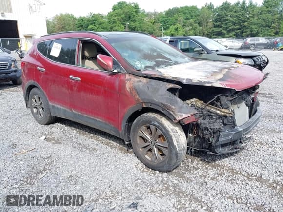 ✅ 2015 Hyundai Santa Fe • VIN: 5XYZUDLB4FG294425 • Lot: 42642628. Listed on IAAI with 89,000 mi. Free auction sales archive from the USA and detailed vehicle history report at DreamBid. Image 1.