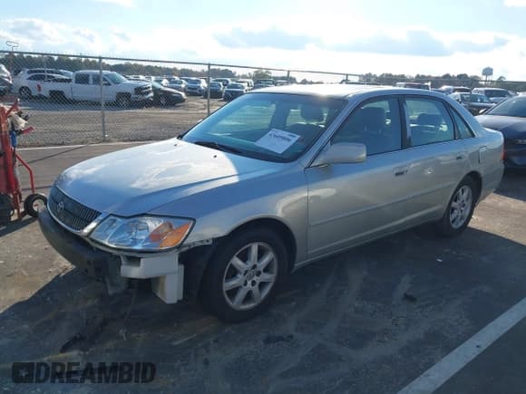 ✅ 2001 Toyota Avalon XLS • VIN: 4T1BF28B81U167348 • Лот: 43605806. Опубликован ранее на IAAI с пробегом 322 733 миль. Бесплатный доступ к архиву аукционных продаж из США и подробный отчёт об истории автомобиля на DreamBid. Изображение 2.