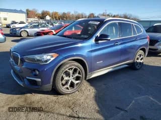 ✅ 2018 BMW X1 sDrive28i • VIN: WBXHU7C31J5H39684 • Lot: 91408235. Listed on Copart with 57,779 mi. Free auction sales archive from the USA and detailed vehicle history report at DreamBid. Image 1.