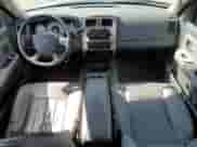 2005 Dodge Dakota Laramie z VIN 1D7HW58N25S200250, wystawiony jako Copart lot #74635094 z przebiegiem 230 871 mil mil oraz Czysty tytuł • Clean title. Historia ofert i sprzedaży dostępna na DreamBid. Obrazek 8.