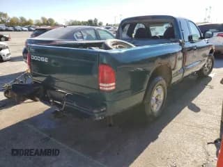 ✅ 1998 Dodge Dakota SLT • VIN: 1B7GL22X6WS661346 • Lot: 77401914. Wystawiony na Copart z przebiegiem 214 497 mil. Bezpłatny archiwum sprzedaży aukcyjnych z USA i szczegółowy raport historii pojazdu na DreamBid. Zdjęcie 3.