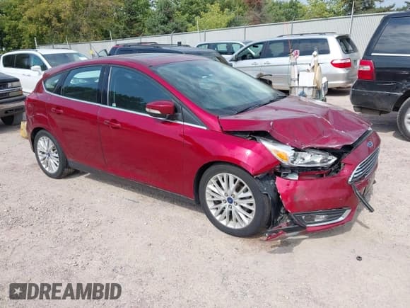 ✅ 2017 Ford Focus Titanium • VIN: 1FADP3N22HL302561 • Lot: 43252752. Listed on IAAI with 129,322 mi. Free auction sales archive from the USA and detailed vehicle history report at DreamBid. Image 1.