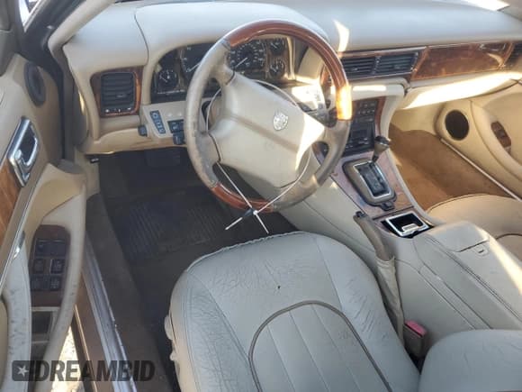 ✅ 1995 Jaguar XJ • VIN: SAJKX1747SC722815 • Лот: 83743934. Опубликован ранее на Copart с пробегом Не указан. Бесплатный доступ к архиву аукционных продаж из США и подробный отчёт об истории автомобиля на DreamBid. Изображение 8.