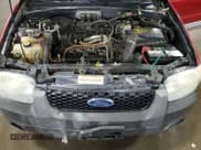 ✅ 2005 Ford Escape Hybrid • VIN: 1FMYU96H75KD76792 • Lot: 66097344. Listed on Copart with 227,214 mi. Free auction sales archive from the USA and detailed vehicle history report at DreamBid. Image 12.