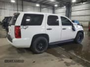 ✅ 2014 Chevrolet Tahoe Commercial • VIN: 1GNLC2E00ER167400 • Lot: 82217174. Listed on Copart with 136,376 mi. Free auction sales archive from the USA and detailed vehicle history report at DreamBid. Image 3.