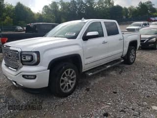 ✅ 2018 GMC Sierra 1500 Denali • VIN: 3GTP1PEC9JG510867 • Lot: 65768565. Listed on Copart with 50,540 mi. Free auction sales archive from the USA and detailed vehicle history report at DreamBid. Image 1.