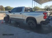 ✅ 2023 Chevrolet Silverado 1500 LT Trail Boss • VIN: 3GCUDFEL9PG326414 • Lot: 86667995. Wystawiony na Copart z przebiegiem 35 262 mil. Bezpłatny archiwum sprzedaży aukcyjnych z USA i szczegółowy raport historii pojazdu na DreamBid. Zdjęcie 2.