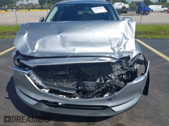 ✅ 2020 Mazda CX-5 Grand Touring • VIN: JM3KFADM4L0738308 • Lot: 43425196. Wystawiony na IAAI z przebiegiem 82 633 mil. Bezpłatny archiwum sprzedaży aukcyjnych z USA i szczegółowy raport historii pojazdu na DreamBid. Zdjęcie 6.