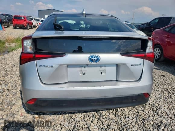 2021 Toyota Prius L Eco with VIN JTDKAMFU1M3150517, listed as a Copart auction lot 70697765 with 107,800 mi miles and Salvage title. Bid and sale history available at DreamBid. Image 6.