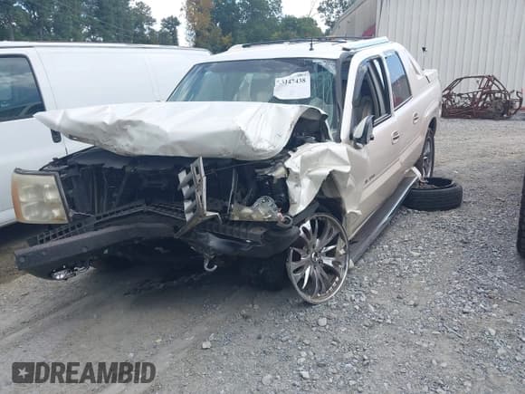 ✅ 2002 Cadillac Escalade EXT • VIN: 3GYEK63N02G231712 • Lot: 43147438. Listed on IAAI with Not provided. Free auction sales archive from the USA and detailed vehicle history report at DreamBid. Image 2.