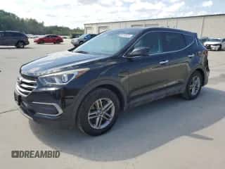 2018 Hyundai Santa Fe 2.4L z VIN 5NMZT3LB1JH071416, wystawiony jako Copart lot #56718425 z przebiegiem 134 004 mil mil oraz Szkoda całkowita • Salvage title. Historia ofert i sprzedaży dostępna na DreamBid. Obrazek 1.
