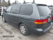 ✅ 2004 Honda Odyssey EX-L • VIN: 5FNRL18074B053021 • Lot: 43810954. Listed on IAAI with 172,771 mi. Free auction sales archive from the USA and detailed vehicle history report at DreamBid. Image 3.