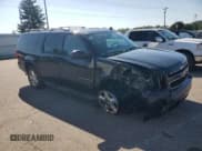 ✅ 2013 Chevrolet Suburban LT • VIN: 1GNSKJE70DR287802 • Lot: 81773405. Listed on Copart with 122,377 mi. Free auction sales archive from the USA and detailed vehicle history report at DreamBid. Image 4.