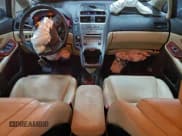 ✅ 2010 Lexus HS 250h Premium • VIN: JTHBB1BA3A2015739 • Lot: 94872855. Listed on Copart with 104,947 mi. Free auction sales archive from the USA and detailed vehicle history report at DreamBid. Image 8.