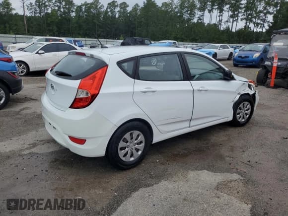 ✅ 2015 Hyundai Accent GS • VIN: KMHCT5AE0FU199379 • Lot: 70676604. Listed on Copart with 115,708 mi. Free auction sales archive from the USA and detailed vehicle history report at DreamBid. Image 3.