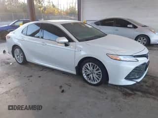 2018 Toyota Camry Hybrid XLE with VIN 4T1B21HK2JU008072, listed as a IAAI auction lot 43465724 with 43,864 mi miles and . Bid and sale history available at DreamBid. Image 1.