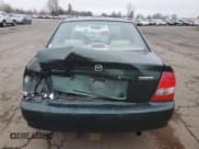 ✅ 2001 Mazda Protege DX • VIN: JM1BJ222910404111 • Лот: 88333775. Опубликован ранее на Copart с пробегом 171 876 миль. Бесплатный доступ к архиву аукционных продаж из США и подробный отчёт об истории автомобиля на DreamBid. Изображение 6.