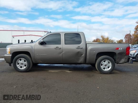 ✅ 2013 Chevrolet Silverado 1500 LTZ • VIN: 3GCPKTE73DG208469 • Lot: 43595097. Listed on IAAI with 190,312 mi. Free auction sales archive from the USA and detailed vehicle history report at DreamBid. Image 14.