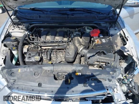 ✅ 2013 Ford Taurus Limited • VIN: 1FAHP2F82DG122868 • Lot: 42487386. Wystawiony na IAAI z przebiegiem 149 033 mil. Bezpłatny archiwum sprzedaży aukcyjnych z USA i szczegółowy raport historii pojazdu na DreamBid. Zdjęcie 10.