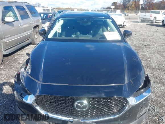 ✅ 2023 Mazda CX-30 S Premium • VIN: 3MVDMBDM1PM510300 • Lot: 43542898. Wystawiony na IAAI z przebiegiem 6 543 mil. Bezpłatny archiwum sprzedaży aukcyjnych z USA i szczegółowy raport historii pojazdu na DreamBid. Zdjęcie 12.