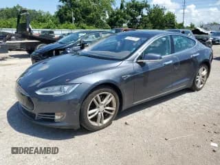 ✅ 2015 Tesla Model S 85D • VIN: 5YJSA1H20FFP71540 • Lot: 63248735. Wystawiony na Copart z przebiegiem Nie podano. Bezpłatny archiwum sprzedaży aukcyjnych z USA i szczegółowy raport historii pojazdu na DreamBid. Zdjęcie 1.