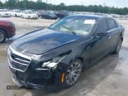✅ 2016 Cadillac CTS Luxury Collection AWD • VIN: 1G6AX5SX8G0111030 • Лот: 42949328. Опубликован ранее на IAAI с пробегом 136 835 миль. Бесплатный доступ к архиву аукционных продаж из США и подробный отчёт об истории автомобиля на DreamBid. Изображение 2.