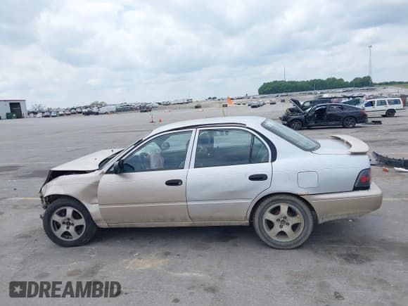 ✅ 1997 Toyota Corolla • VIN: 1NXBA02E2VZ589613 • Лот: 42502914. Опубликован ранее на IAAI с пробегом 218 590 миль. Бесплатный доступ к архиву аукционных продаж из США и подробный отчёт об истории автомобиля на DreamBid. Изображение 14.
