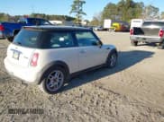 ✅ 2006 MINI Hardtop • VIN: WMWRC335X6TK16871 • Lot: 41846929. Listed on IAAI with 145,709 mi. Free auction sales archive from the USA and detailed vehicle history report at DreamBid. Image 4.