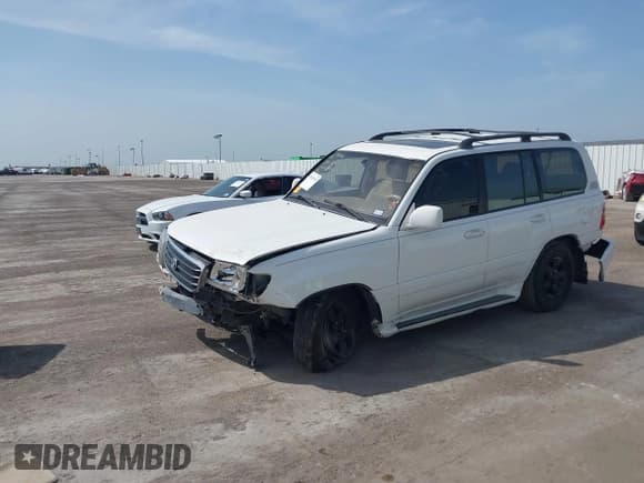 ✅ 2000 Toyota Land Cruiser • VIN: JT3HT05J1Y0092165 • Lot: 42067694. Wystawiony na IAAI z przebiegiem 351 568 mil. Bezpłatny archiwum sprzedaży aukcyjnych z USA i szczegółowy raport historii pojazdu na DreamBid. Zdjęcie 2.