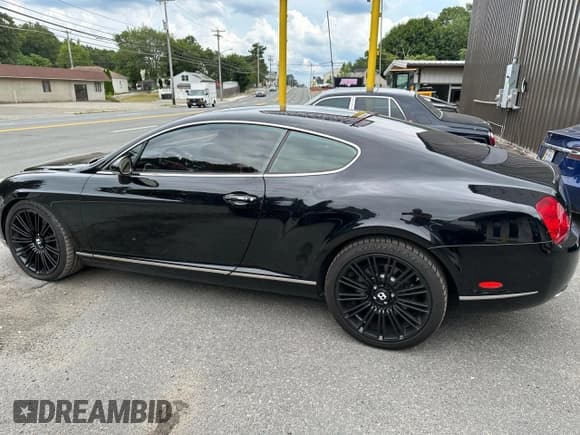 ✅ 2007 Bentley Continental GT • VIN: SCBCR73W17C040241 • Lot: 91603445. Wystawiony na Copart z przebiegiem 92 913 mil. Bezpłatny archiwum sprzedaży aukcyjnych z USA i szczegółowy raport historii pojazdu na DreamBid. Zdjęcie 14.