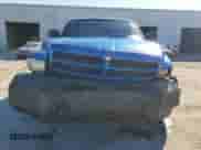 2000 Dodge 1500 с VIN 3B7HF13Z9YG148639, выставлен на аукционе Copart как лот 87698355 с пробегом 273 328 миль миль и Списание • Salvage title. История ставок и продаж доступна на DreamBid. Изображение 5.