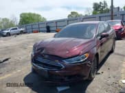 ✅ 2017 Ford Fusion Hybrid Titanium • VIN: 3FA6P0RU8HR321040 • Lot: 42041574. Listed on IAAI with 106,525 mi. Free auction sales archive from the USA and detailed vehicle history report at DreamBid. Image 2.